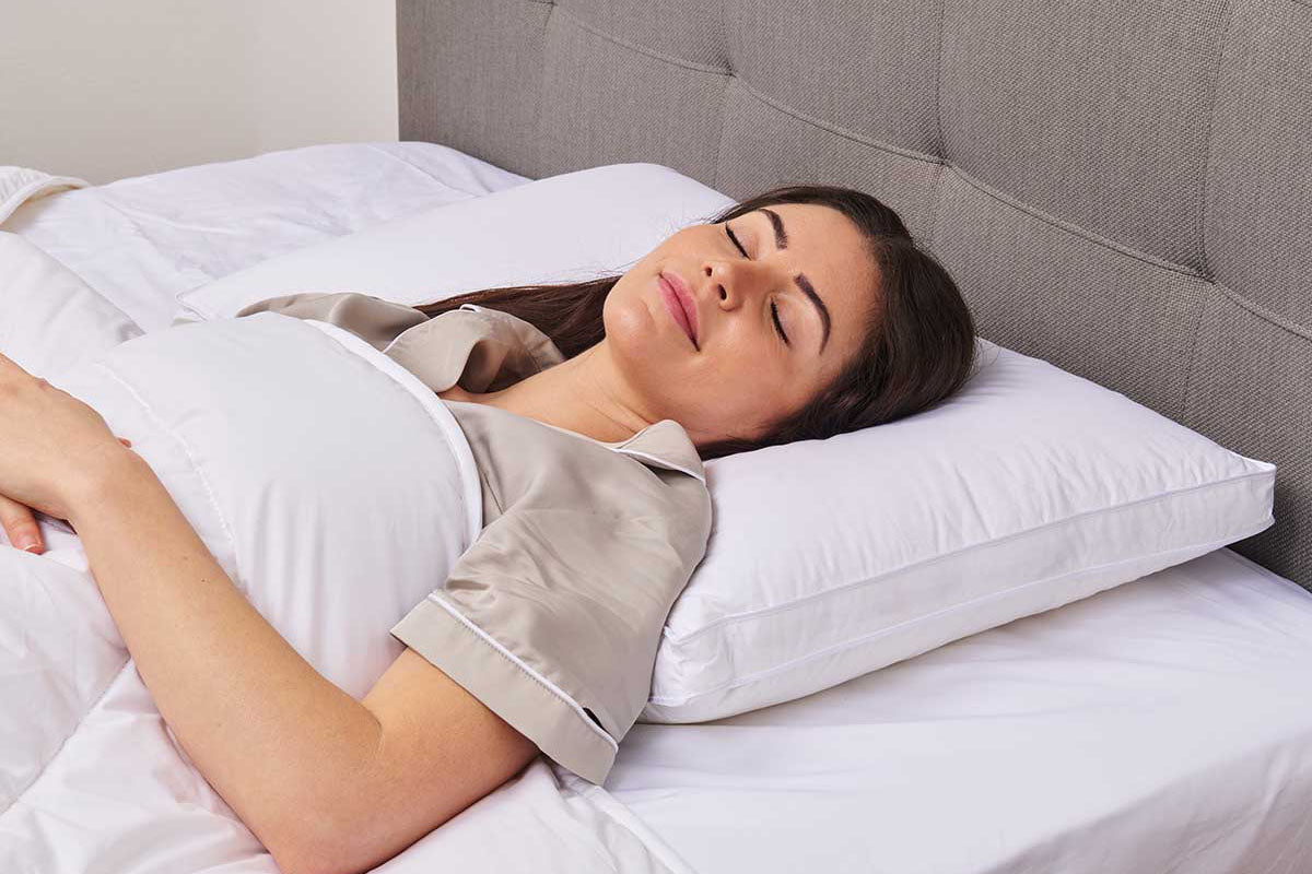 Woman sleeping on a supportive pillow