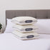 Three memory pillows labeled &